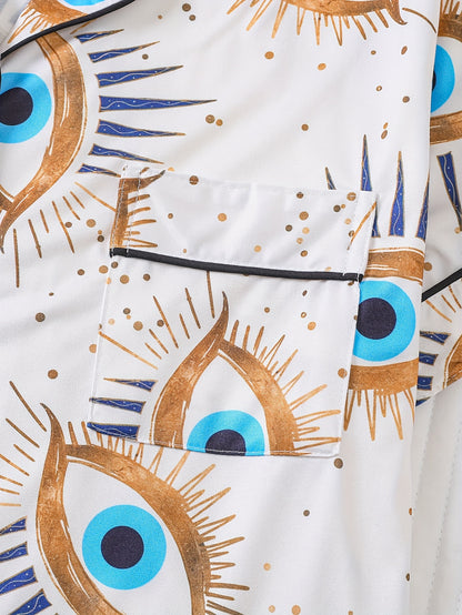 Two Piece Women's Elegant Polyester White Pajama Set with Eye Print, Fabric, All Season Comfort, Short Sleeve Button Top with Collar And Matching Shorts, with All Over Print And Pocket Details, Perfect for Adults Pajama Set