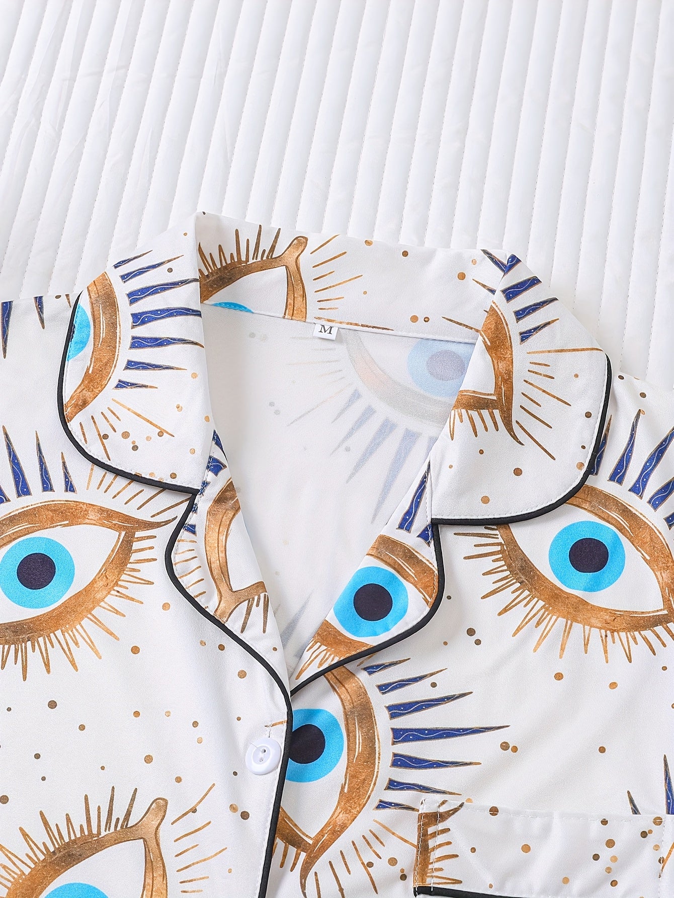 Two Piece Women's Elegant Polyester White Pajama Set with Eye Print, Fabric, All Season Comfort, Short Sleeve Button Top with Collar And Matching Shorts, with All Over Print And Pocket Details, Perfect for Adults Pajama Set